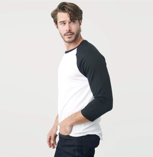 Man wearing a True Classic white and black raglan shirt.