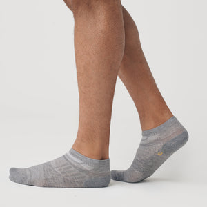 True ClassicHeather Gray Ankle Socks 12-Pack on feet, showcasing ventilation panels.
