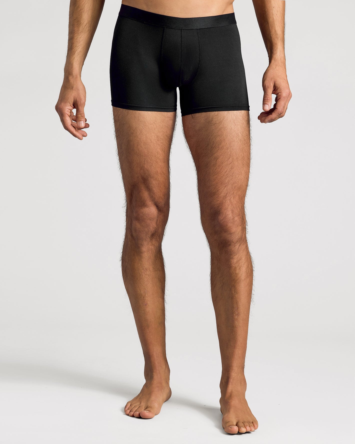 Black Boxer Trunks 12-Pack, featuring a male model showcasing fit and design.