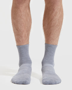 True ClassicHeather Gray Half Crew Socks on feet, showcasing seamless toe and contour seam.