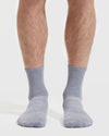 Heather Gray Half Crew Socks on feet, showcasing seamless and contour seams.