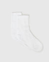 Combo Half Crew Socks 12-Pack, plain white, laid flat, seamless toe seam.