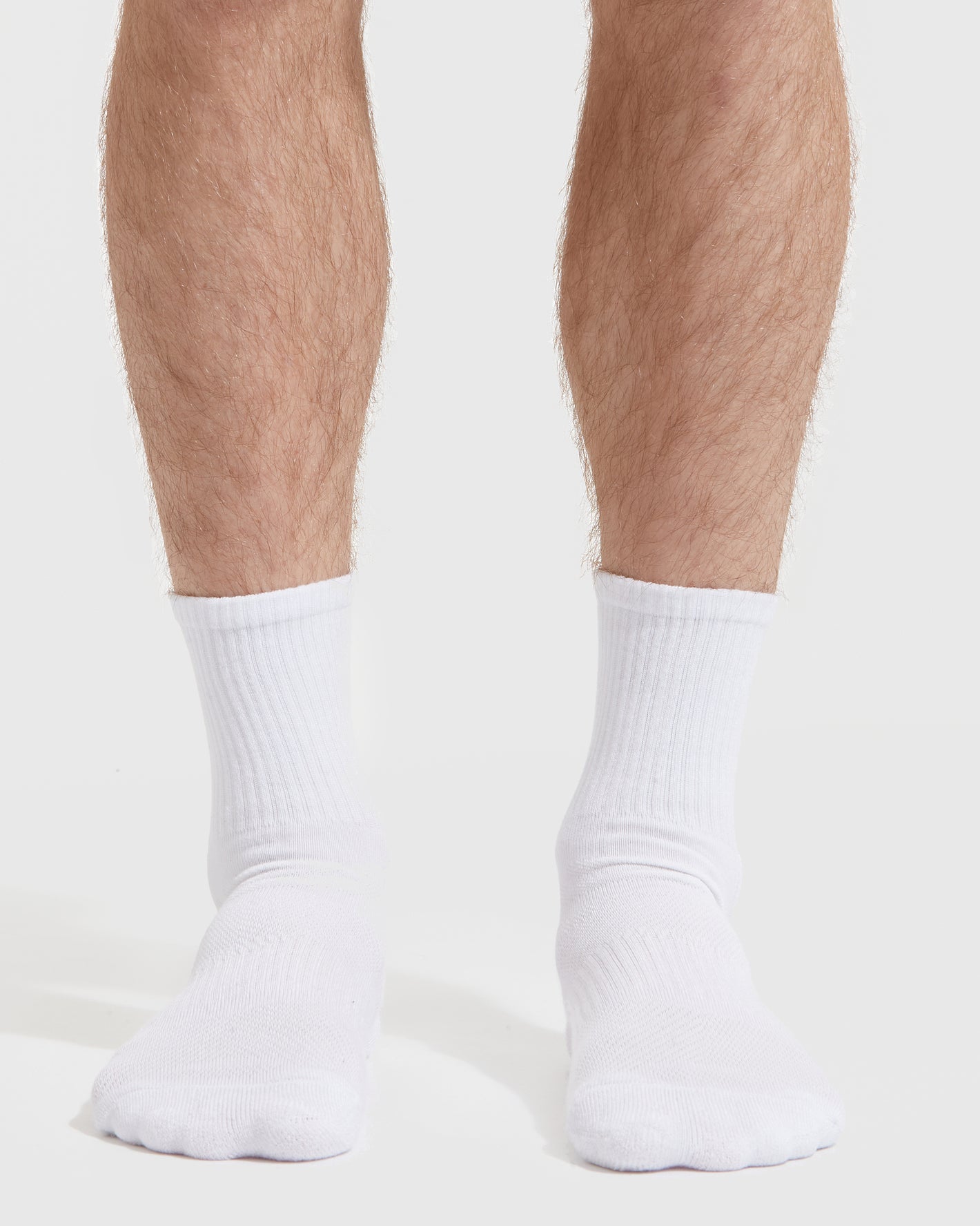 Combo Half Crew Socks 6-Pack on feet, showcasing sleek design.