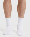 Combo Half Crew Socks 12-Pack on model's feet, showcasing ribbed texture.