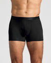 Black Boxer Trunks W/ Fly 6-Pack on model's midsection, showcasing relaxed fit.