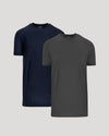 Two short-sleeve crew-neck t-shirts shown on a light gray background, with one in navy blue and the other in dark gray, layered slightly behind each other.