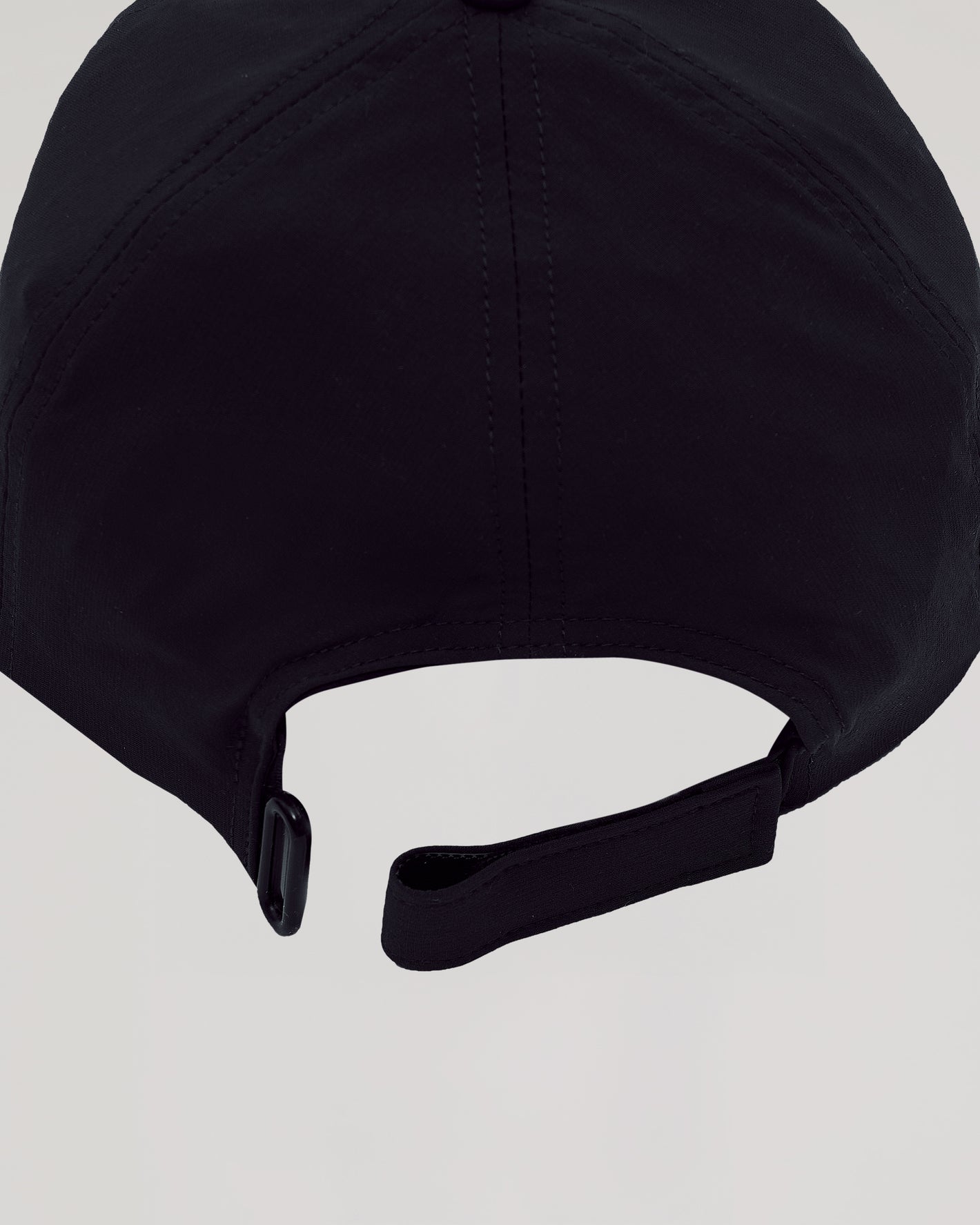 Black Active Running Cap showing six-panel stitching and adjustable strap closure.