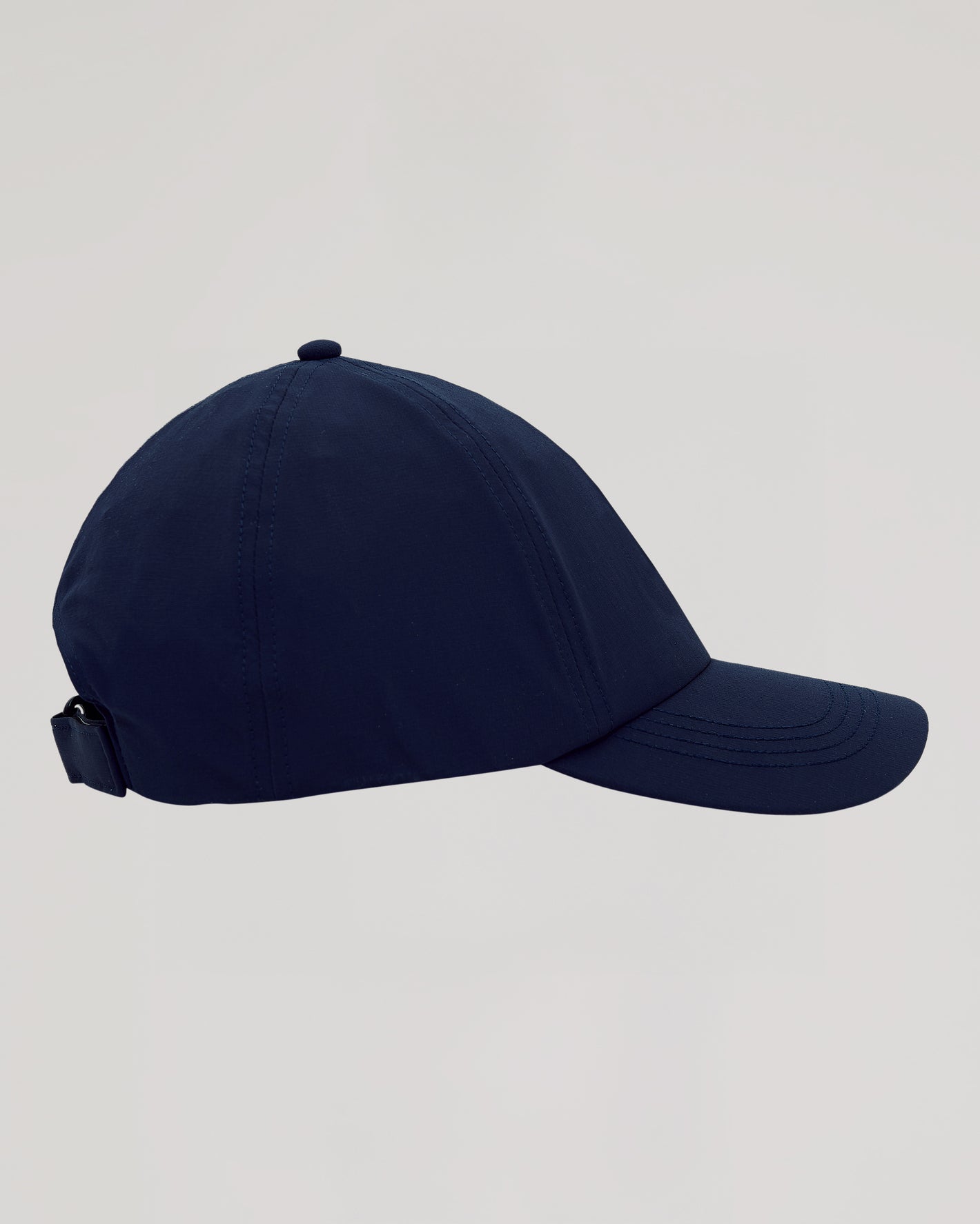Navy Active Running Cap with curved brim and adjustable strap.