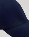 Navy Active Running Cap with curved brim and detailed stitching.