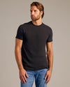 Young man in Try 1 Of Everything 5-Pack black tee.