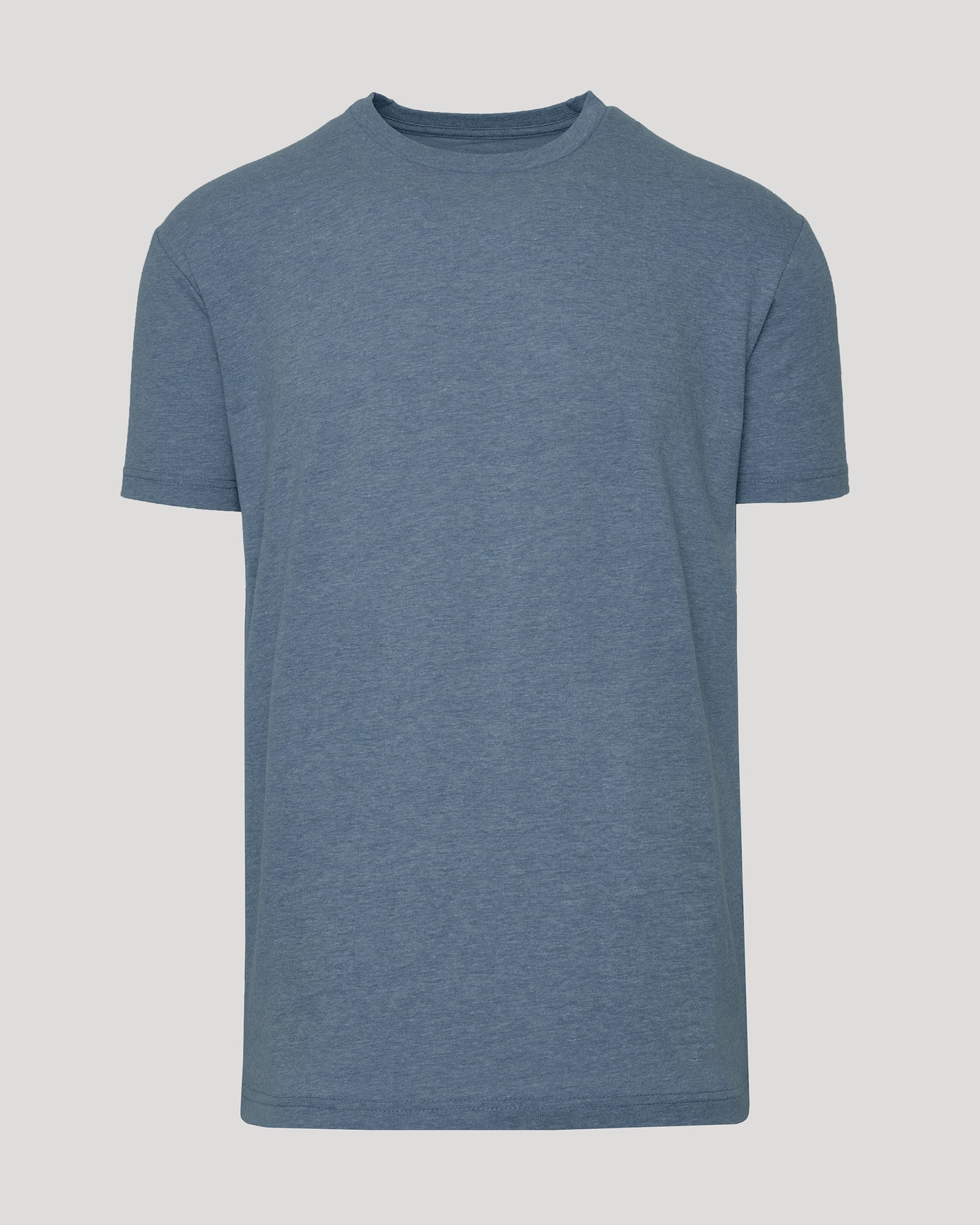 Dark Heather Tempest Classic Crew Neck T-shirt on gray background.
