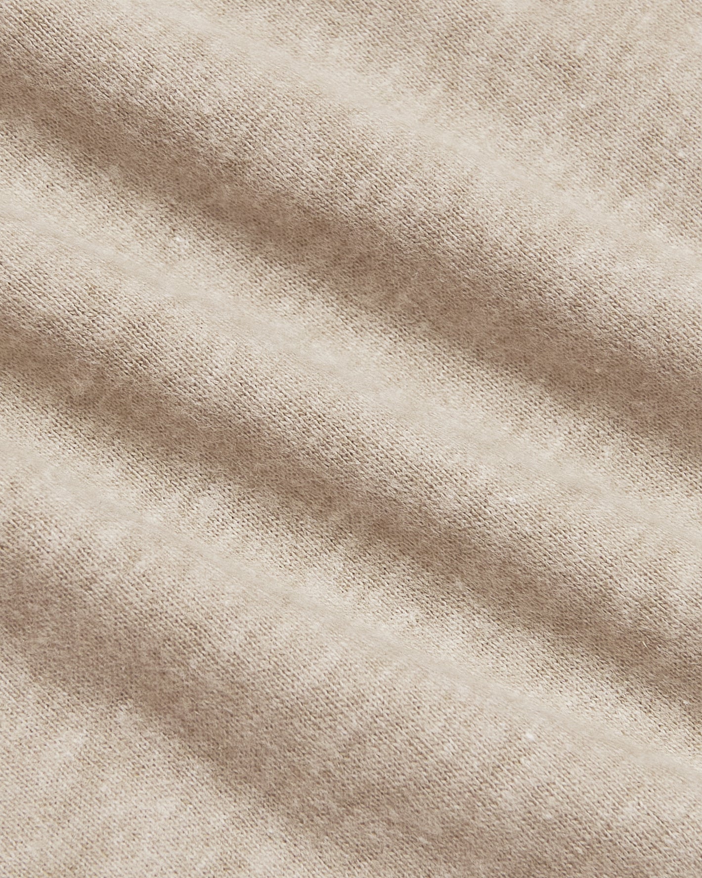 Heather Fennel Classic Crew Neck: close-up of beige knit texture.