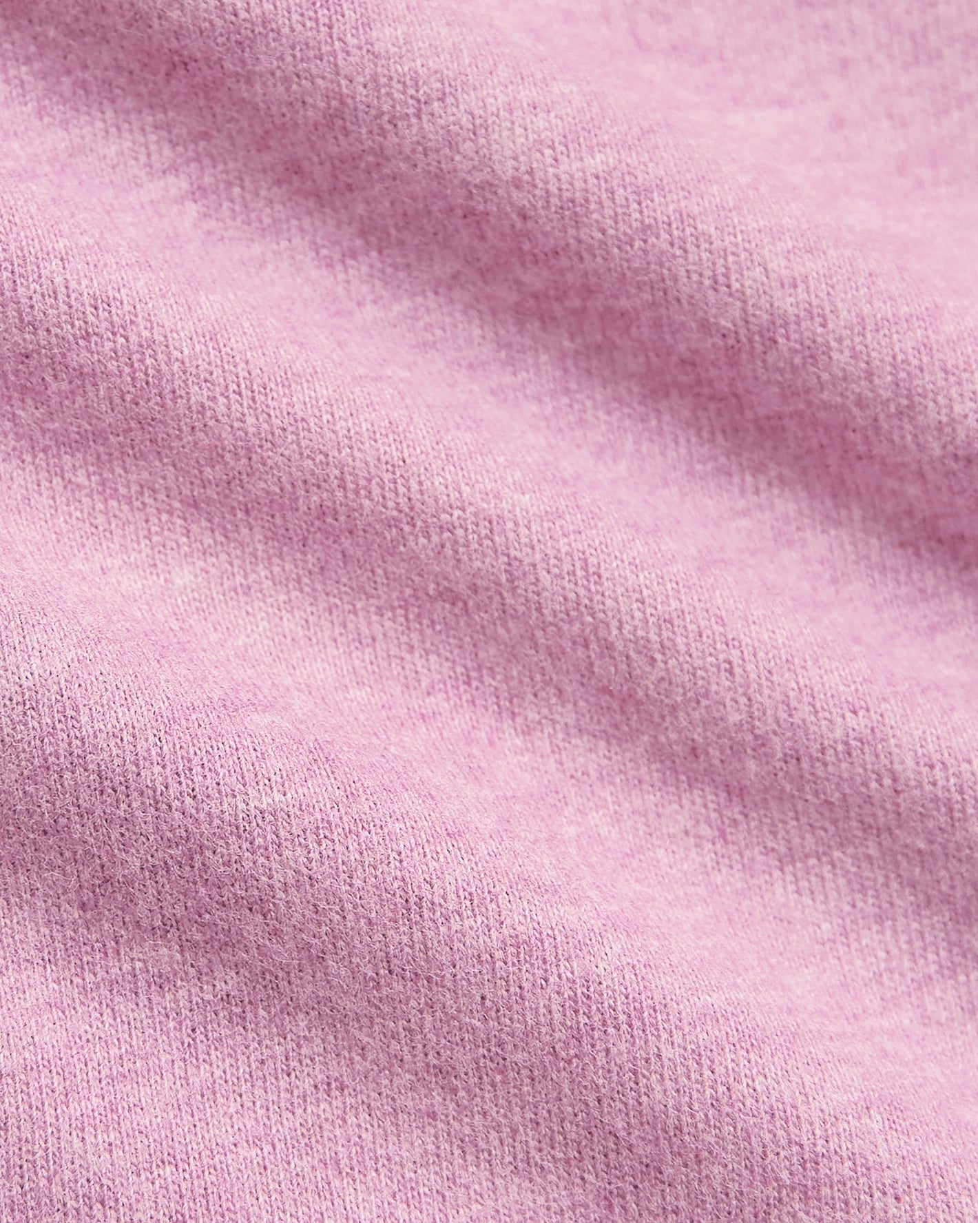 Heather Mauve Classic Crew Neck in soft, pink knit fabric close-up.