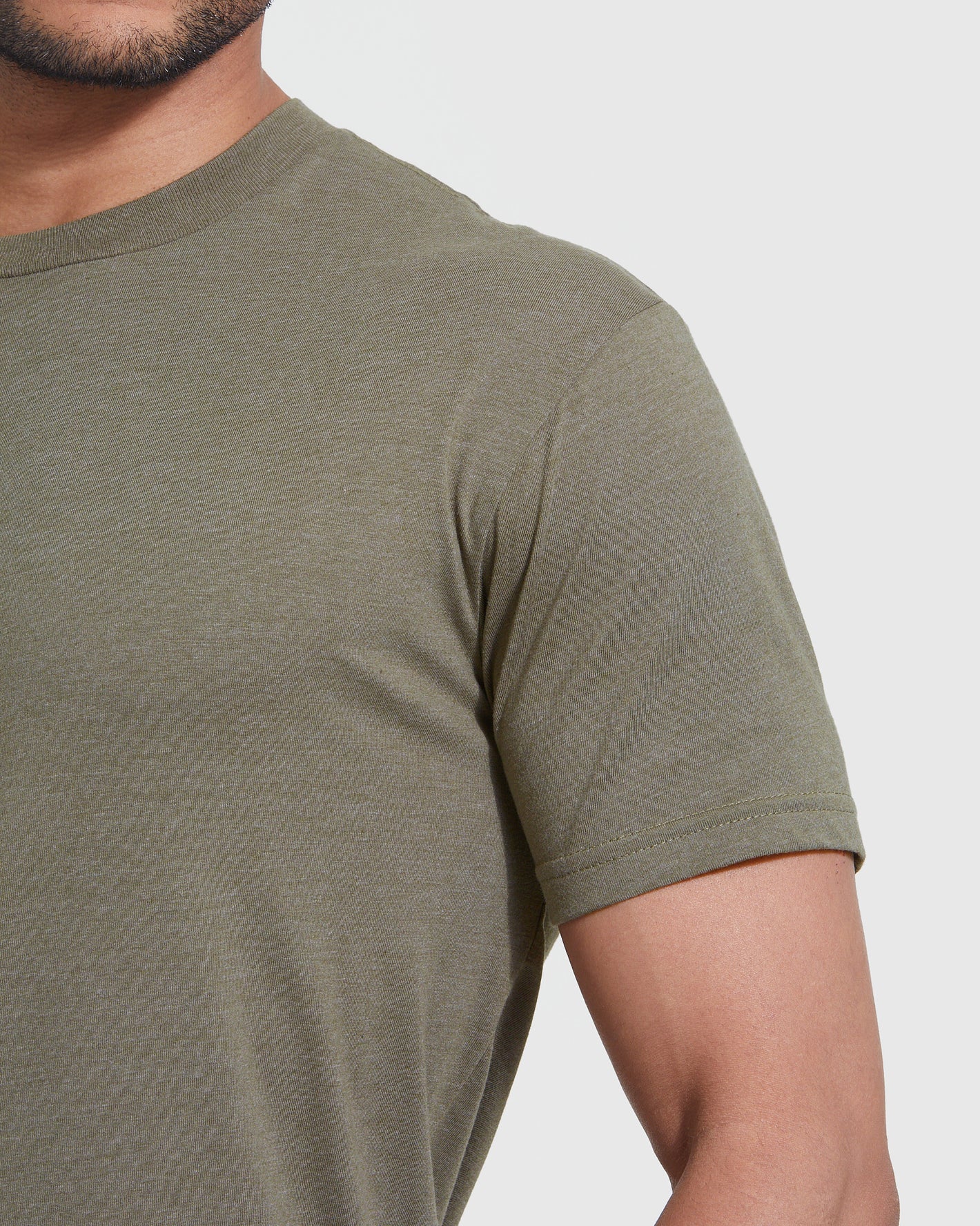Heather Military Green Classic Crew Neck on person, showing neckline and sleeve.
