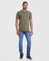 Man wearing Heather Military Green Classic Crew Neck with jeans and sneakers.
