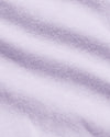 Heather Orchid Classic Crew Neck in soft, fine-knit fabric with gentle folds.