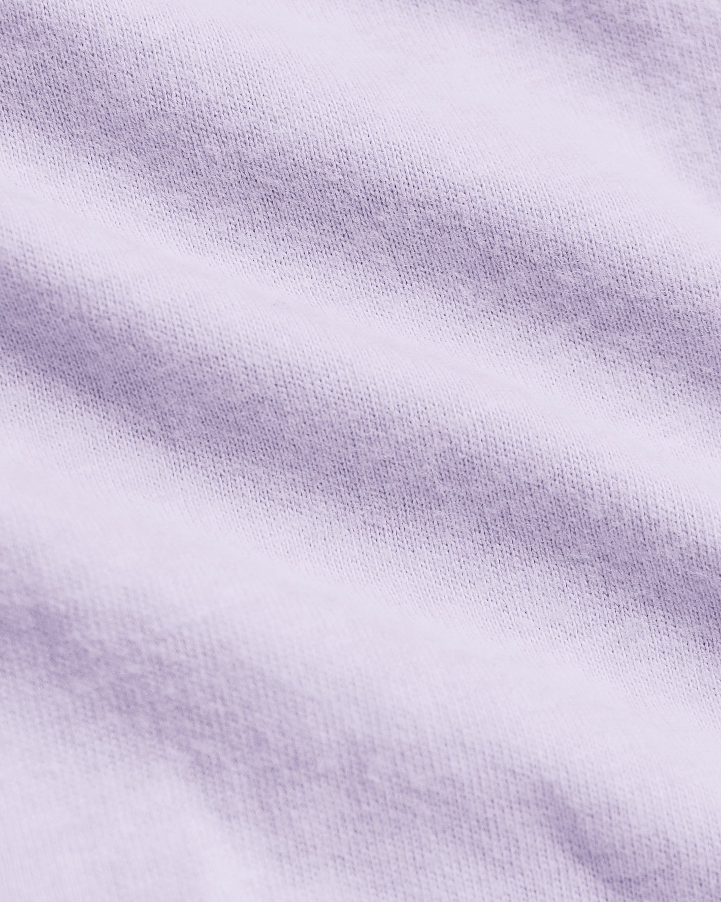 Heather Orchid Classic Crew Neck in soft, fine-knit fabric with gentle folds.