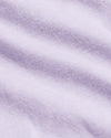 Heather Orchid Classic Polo, close-up of lilac knit fabric texture.