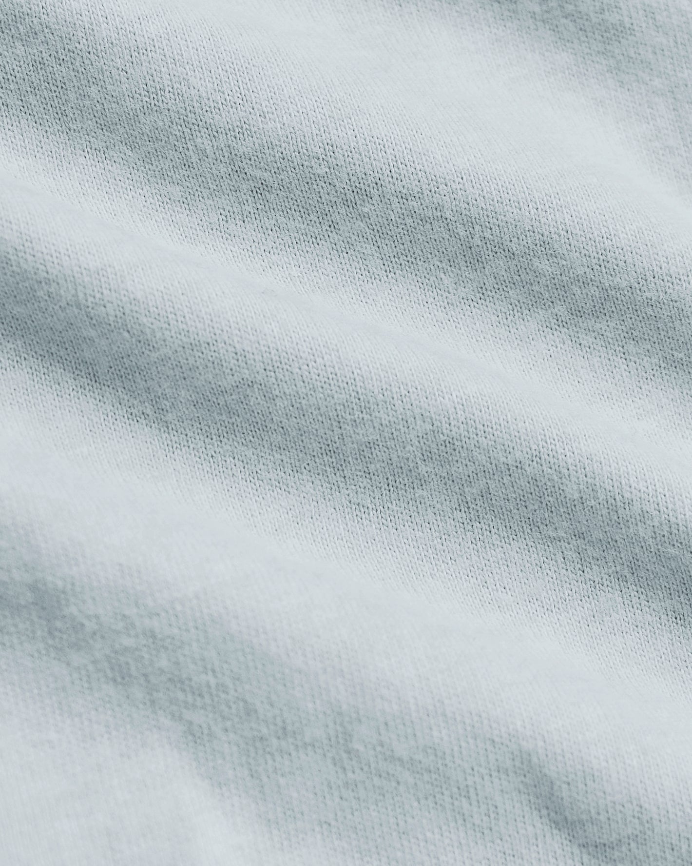 Close-up of textured light gray fabric