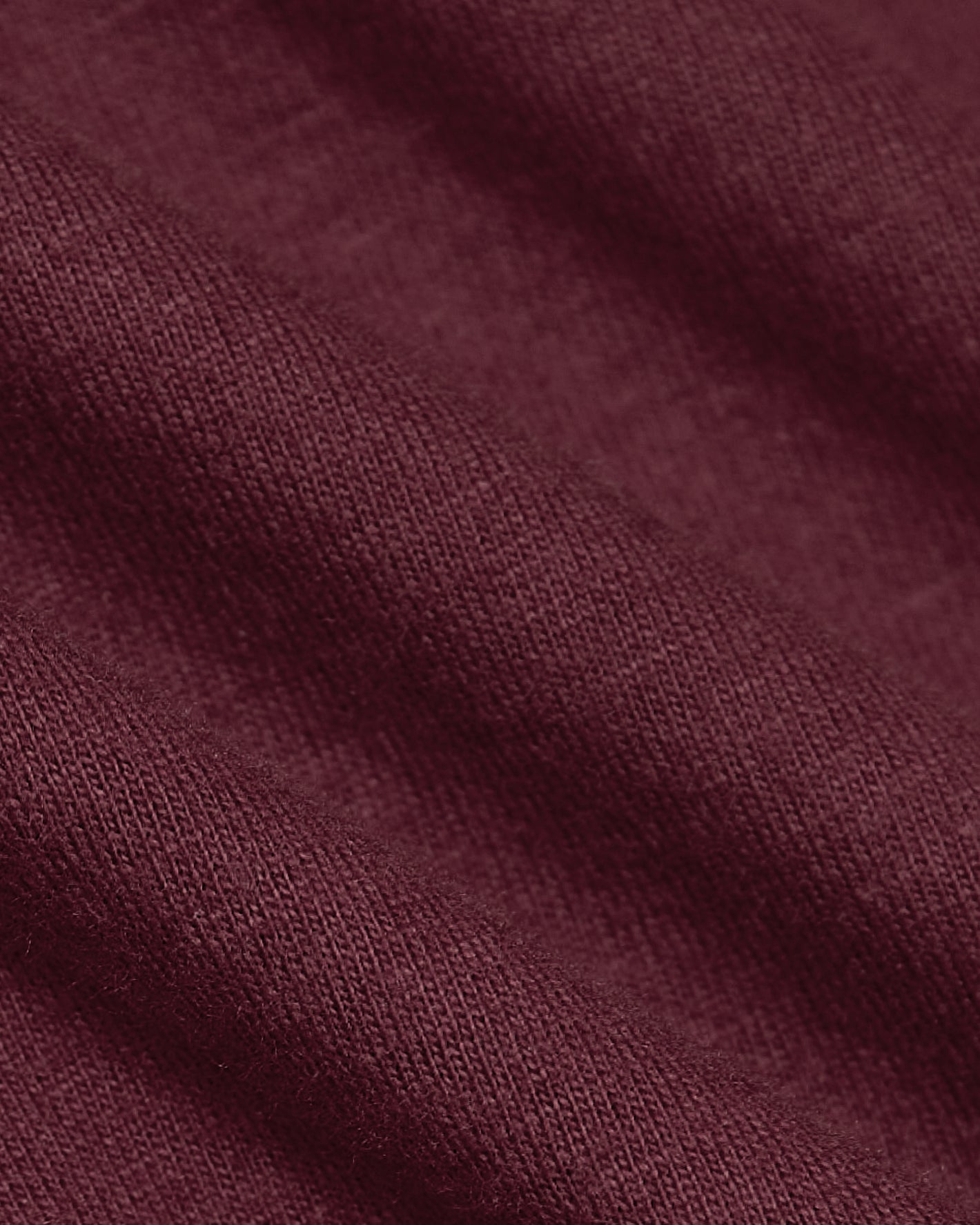 Mahogany Long Sleeve T Shirt, textured burgundy fabric, visible weave detail.