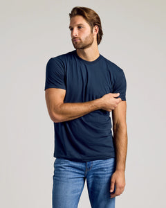 True ClassicCrew Core Sleeve Variety 6-Pack modeled by man adjusting shirt sleeve.