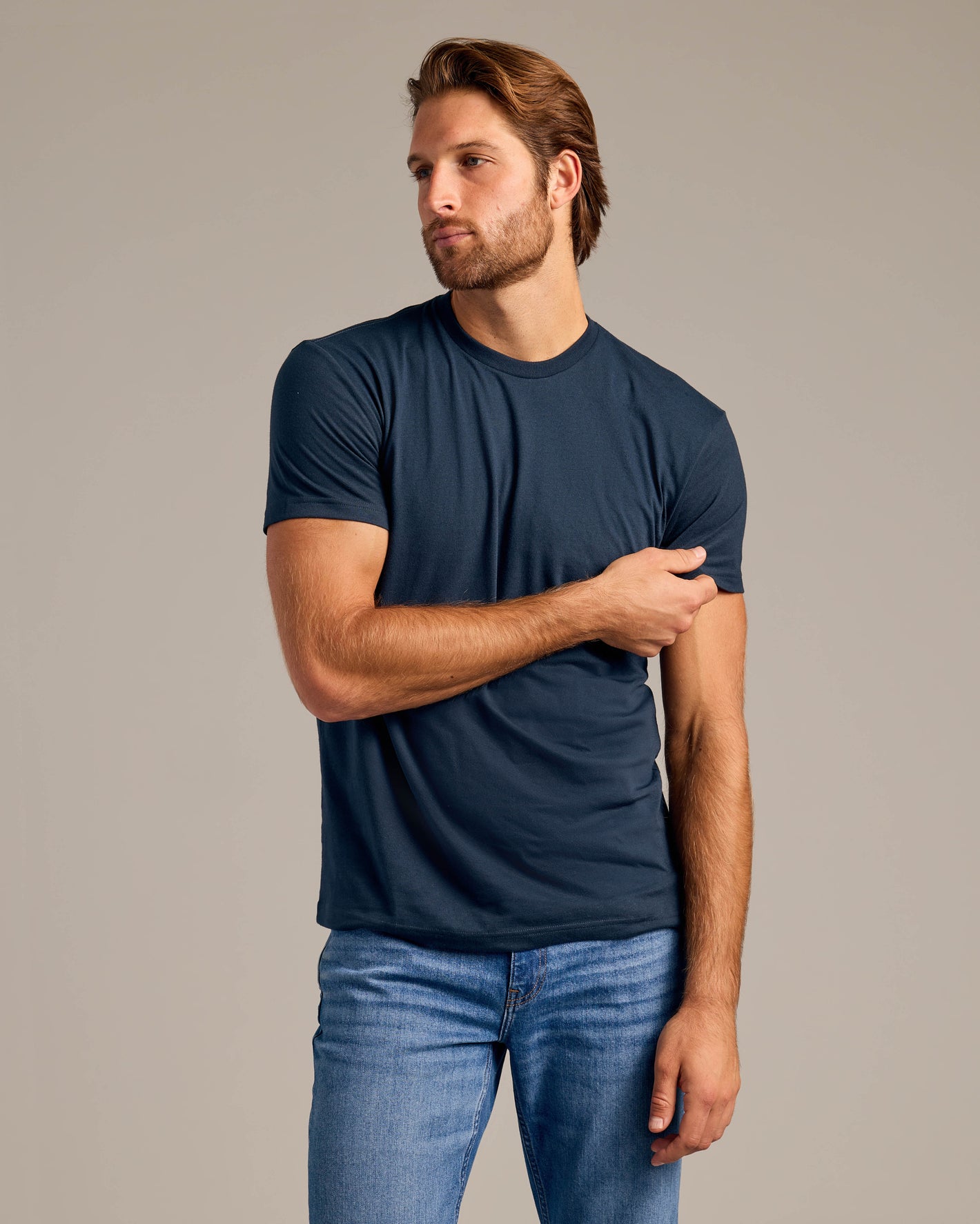 Young man modeling Navy Classic Tee from Short Sleeve Variety 9-Pack.