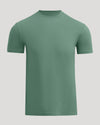 A solid sage green short-sleeve crewneck t-shirt displayed on a neutral light gray background.