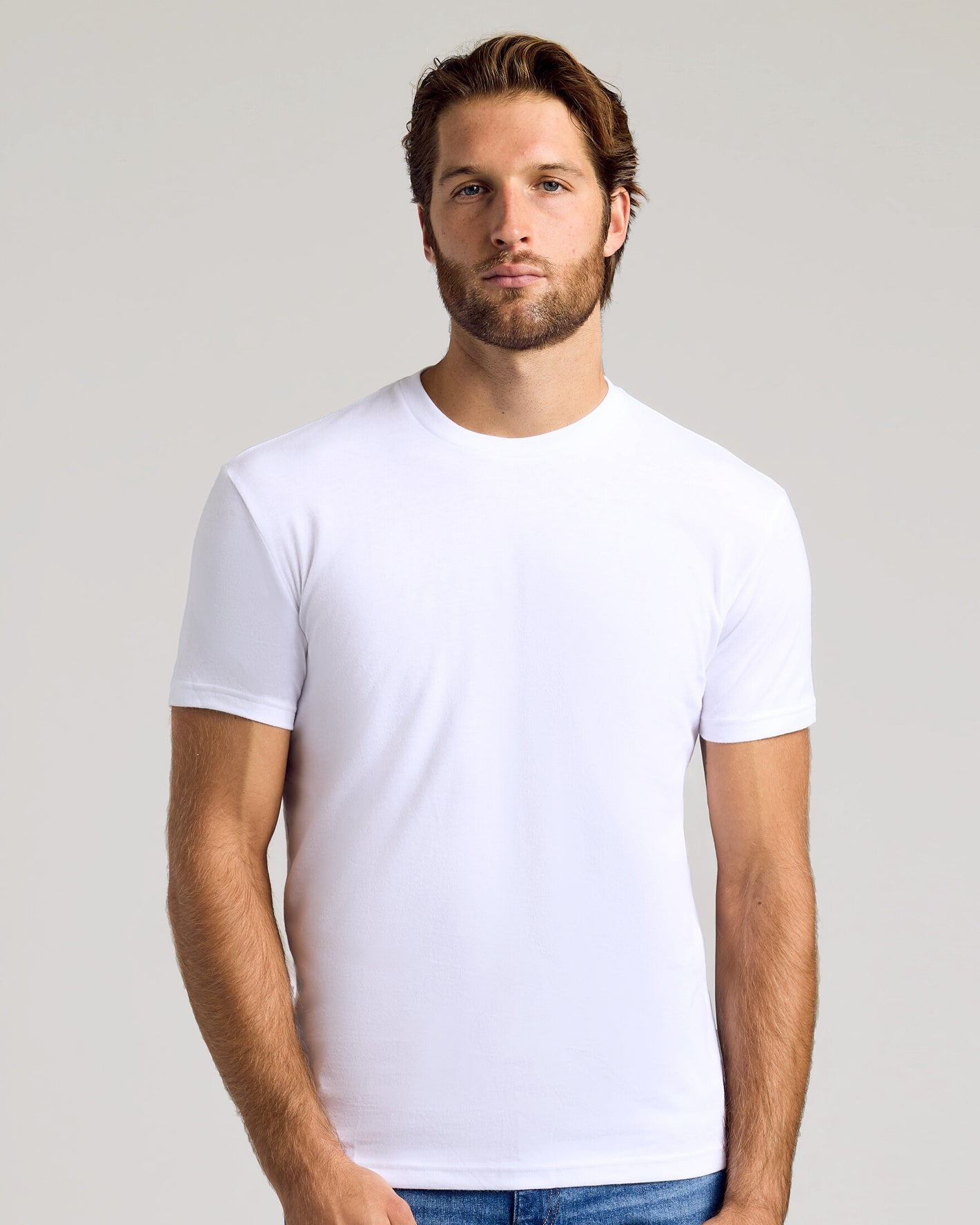 The Fleece Fit 3-Pack: man models white crewneck tee.