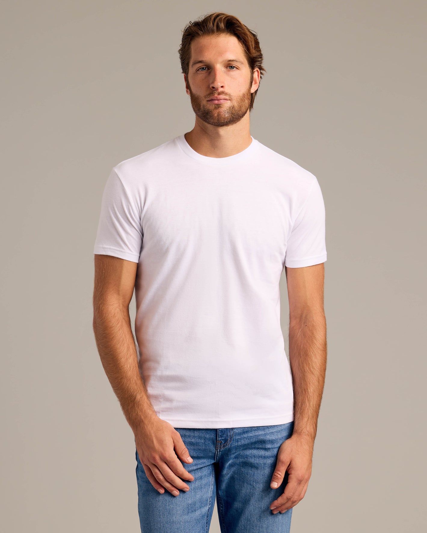 Man modeling 3 Day Travel Pack's white crew-neck T-shirt.