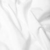 White Classic Polo 3-Pack, close-up of white fabric with gentle folds.