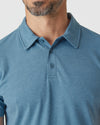 Blue Lake Heather Classic Polo showcasing collar and three-button placket.