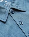 Blue Lake Heather Classic Polo collar with buttons and printed label.