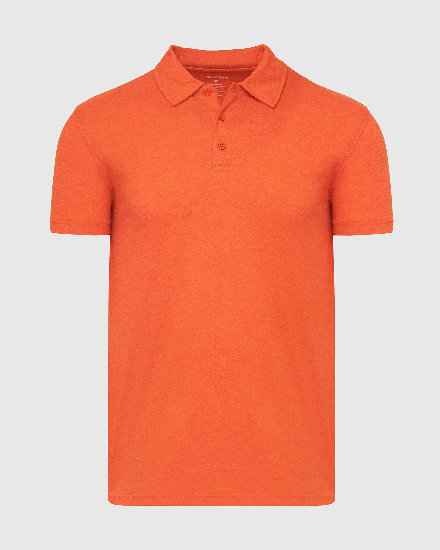 Burnt Orange Heather Classic Polo with short sleeves and a three-button placket.