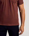 Dark Chocolate Short Sleeve Polo worn with dark pants.
