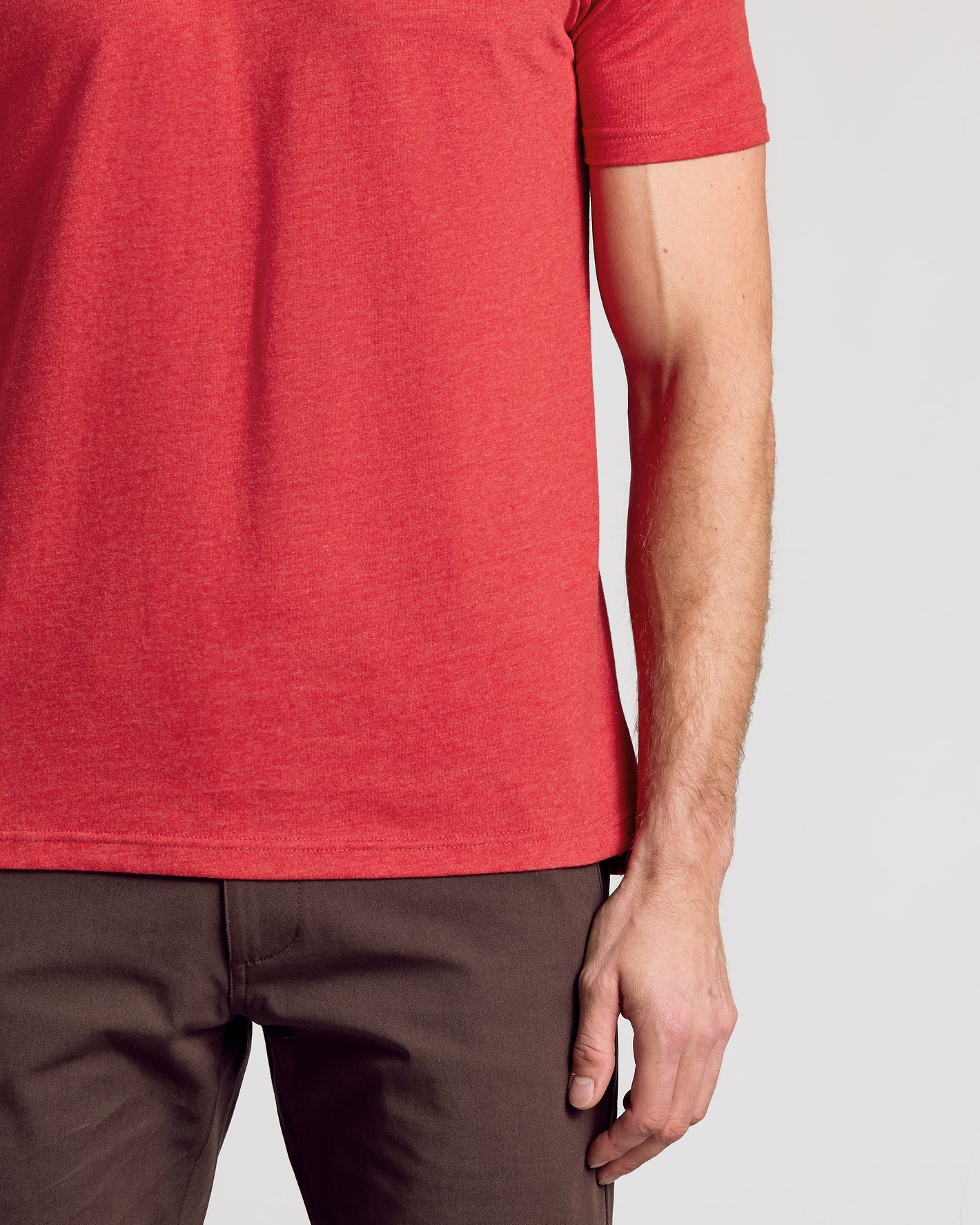 Dark Heather Lava Short Sleeve Polo with three-button placket and athletic fit.