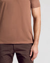 Dark Heather Sepia Classic Polo worn with dark brown pants.