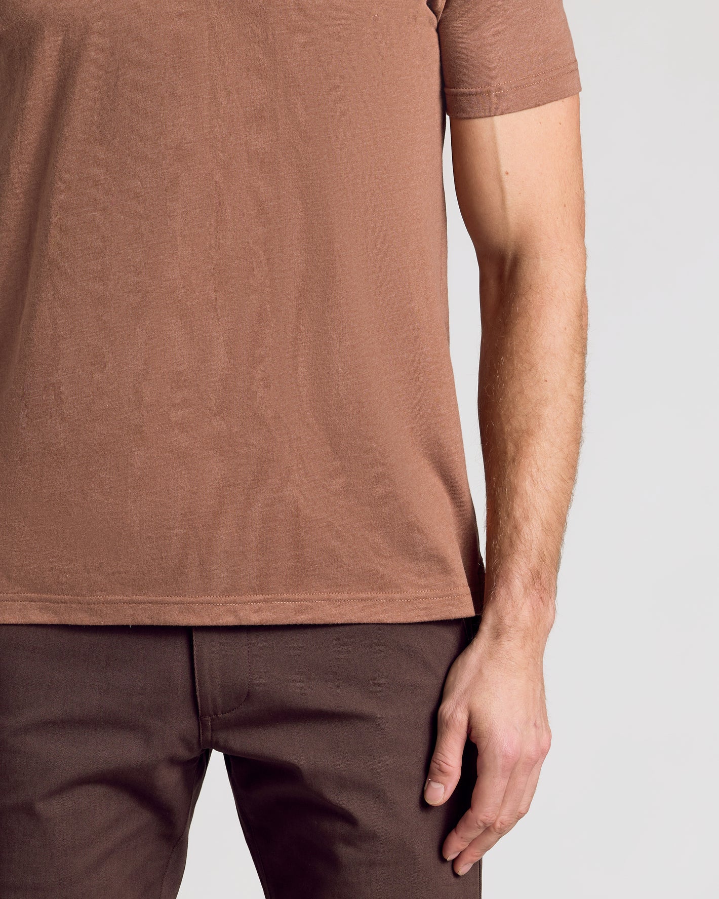Dark Heather Sepia Classic Polo worn with dark brown pants.