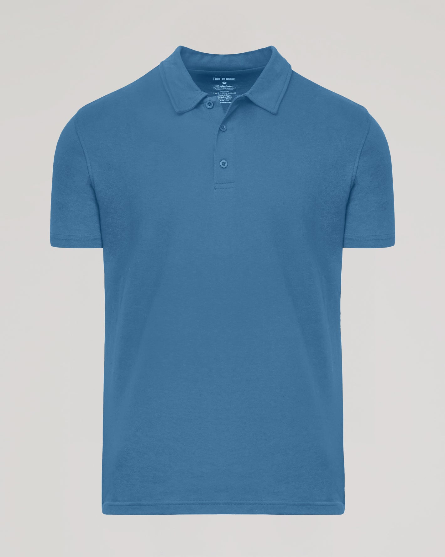 Fiord Classic Polo in mid-blue with a classic collar and two-button placket.