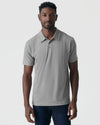Man wearing Glacier Gray Classic Polo, short-sleeve, with dark jeans.