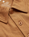 Golden Mane Classic Polo with collar, two buttons, and soft printed tag.