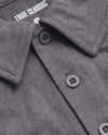 Heather Graphite Short Sleeve Polo with collar, buttons, and “TRUE CLASSIC” label visible.