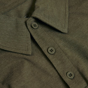 True ClassicHeather Polo 3-Pack: Close-up of olive-green collared shirt with buttons.