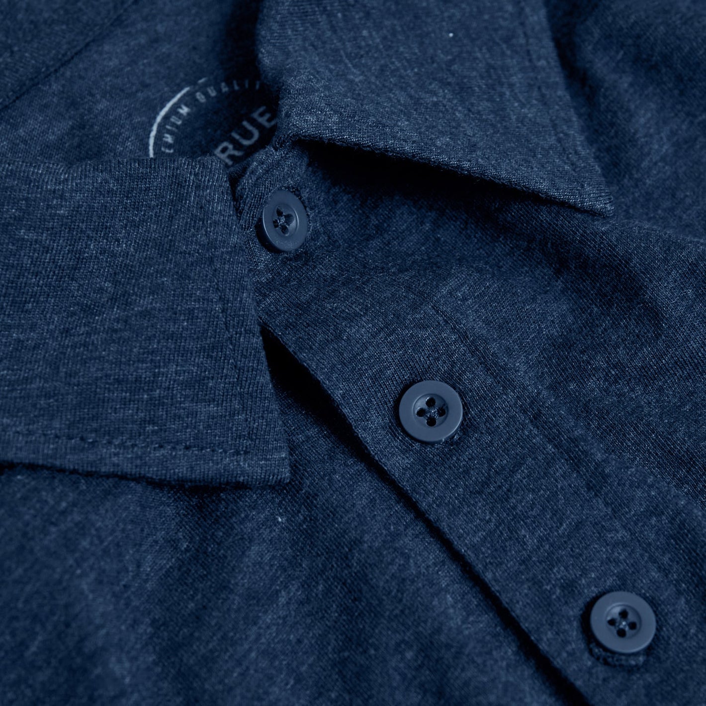 Heather Polo 3-Pack navy shirt with folded collar, three buttons.
