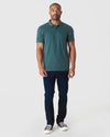 Glacial Short Sleeve Polo 3-Pack modeled by man in jeans.