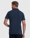 Back view of All Navy Short Sleeve Polo on model.