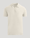 Oatmeal Classic Polo with three-button placket and straight hem.