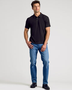 True ClassicAll Black Classic Polo 10-Pack styled with blue jeans and boots.