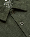 Racing Green Heather Polo with folded collar and button placket.