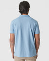 Sky Blue Heather Polo, back view, worn with tan pants.