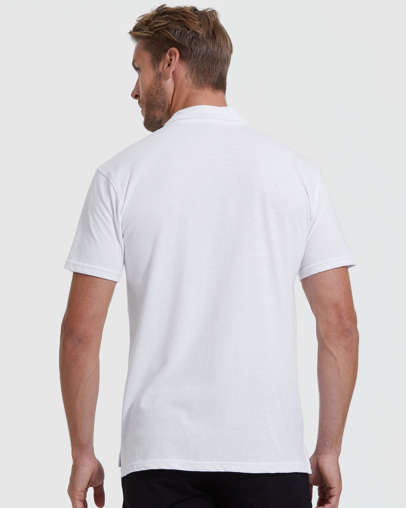 Back view of model in White Classic Polo from 3-Pack.